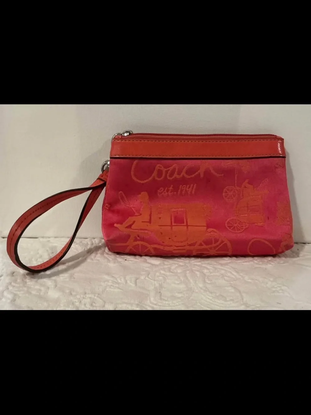 Pink and Orange Coach Wristlet